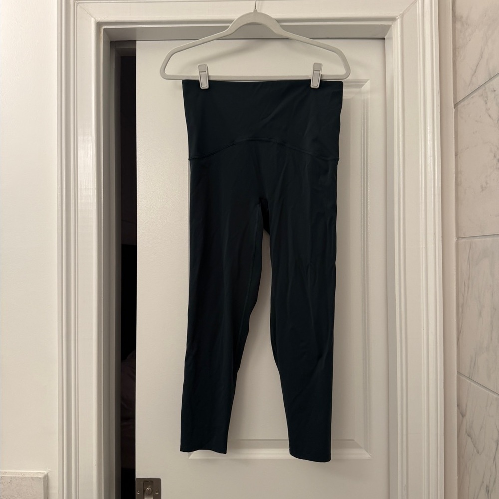 SPANX Booty Boost Active 7/8 Leggings
Color: Dark Emerald
Size: L